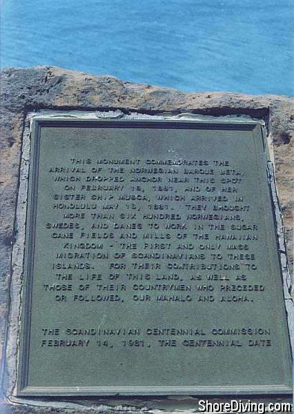 The plaque found at this site commemorates the arrival of hundreds of Norwegians, Swedes and Danes to work the sugar plantations in 1881.