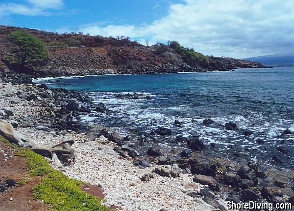 It can be a little difficult walking across the lava rocks to get to the deeper water.  Hold you buddy's hand for the first few yards to stabilize your entry.