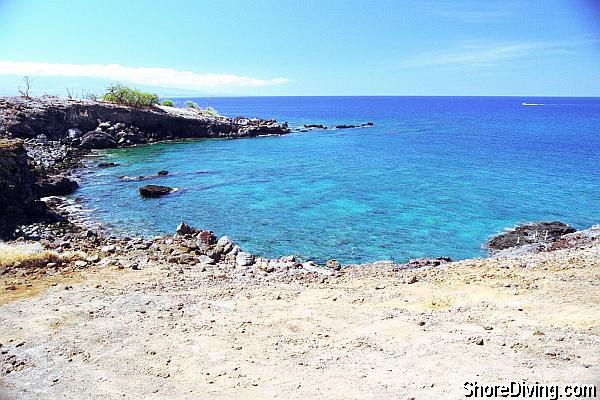 After hiking for a bit, you'll come upon the small bay.  Just ease your way down the right side of the bay toward the fishing pole holders.