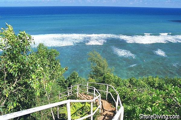 Head down the very narrow dirt path next to the tennis courts to the beginning of the bluff 'stairway.'  The guard rails are there for a reason; it can get a little slippery when damp.