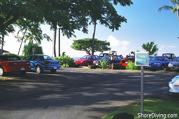 Here is the primary parking for a dozen cars right next to the public access beach