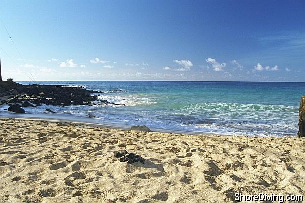 Entry is straight down the sandy beach.