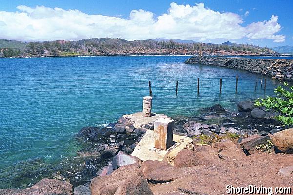 Find a suitable ledge here to enter.  Conditions are usually favorable at this point because of the jetty.