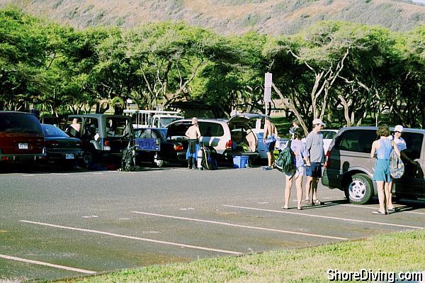 There is plenty of parking, all day for a dollar.  Bring some extra dollar bills with you to pay for the trolley, since you can't drive your gear down to the beach. You could carry your gear up and down the steep climb, but we didn't!