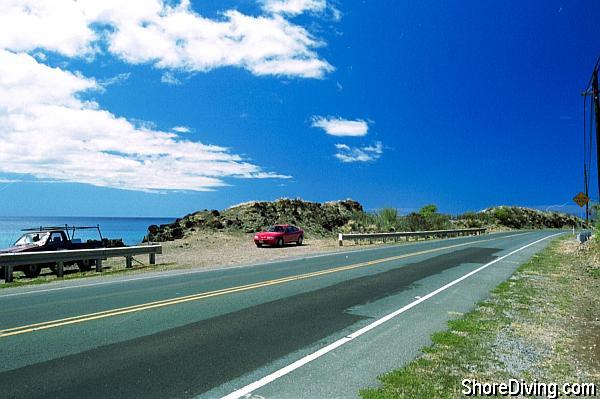 You'll find parking for a few cars between the guard rails.