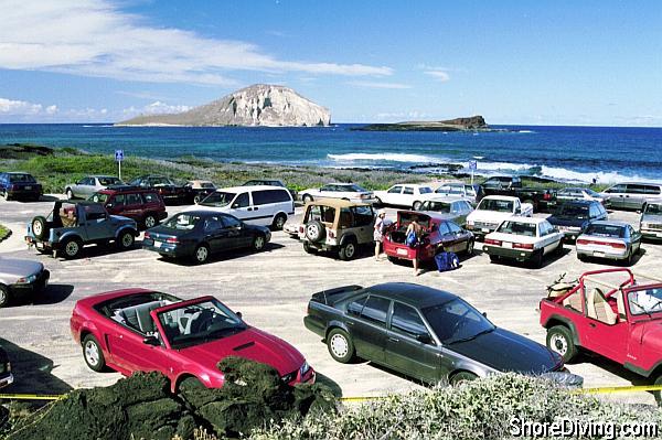 Parking is at the bottom of the hill, with Rabbit Island in the background.