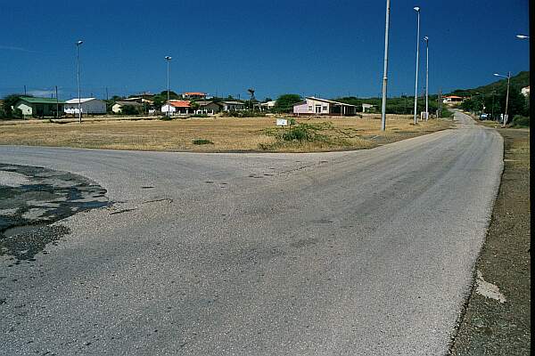 Within a 100 meters, you'll see this fork in the road.  Turn left, and follow the road to Kalki.