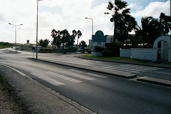 You can't miss the entrance.  Drive to the far left end of the parking lot.