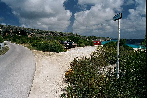 The parking is on hard-packed coral and sand.