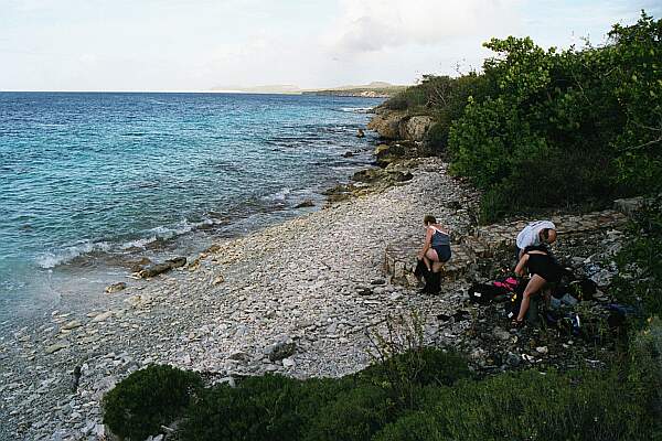 Carry your gear a few meters from your car to the shore, and suit up.