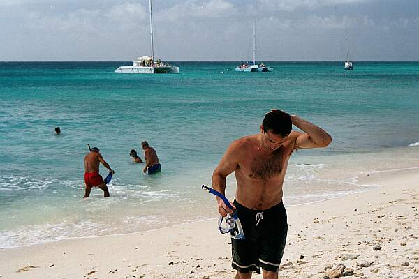 Commercial snorkeling boats are in the background, and the Antilla Wreck is several hundred meters beyond.