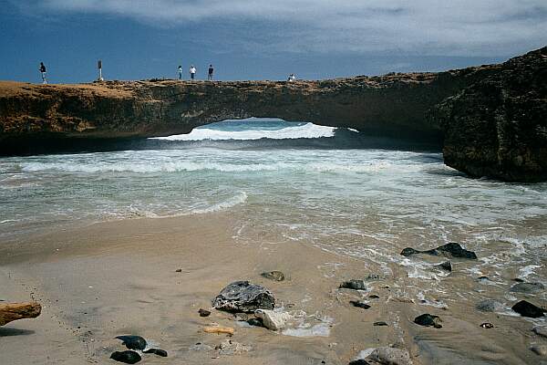 The entry is off the sandy beach, through the arch.   You can tell the surf is too rough for entry at this time.