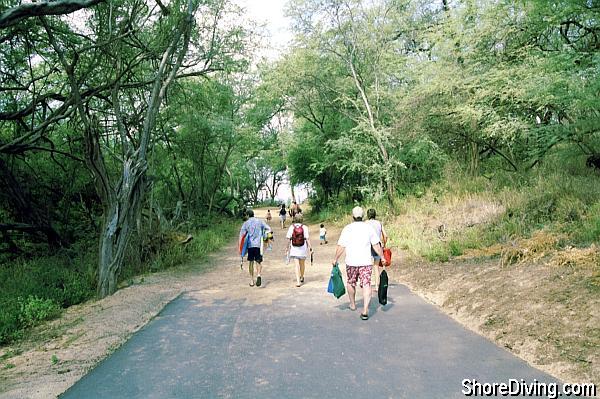 You have a 100 yard walk down this trail, and then another 200 to the entry of the first beach.