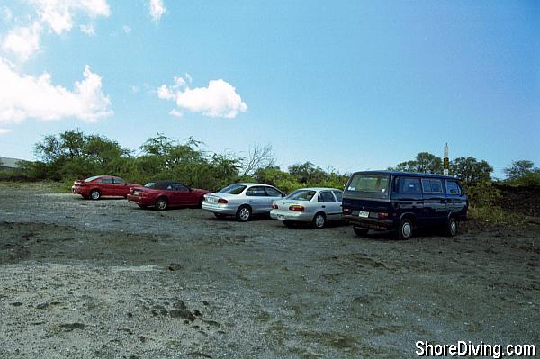 This is hard-lava parking, with the trail head to the right.