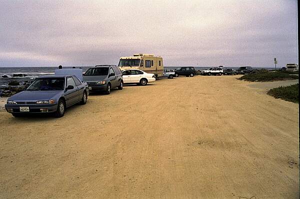 A dirt lot is just feet from the entry.