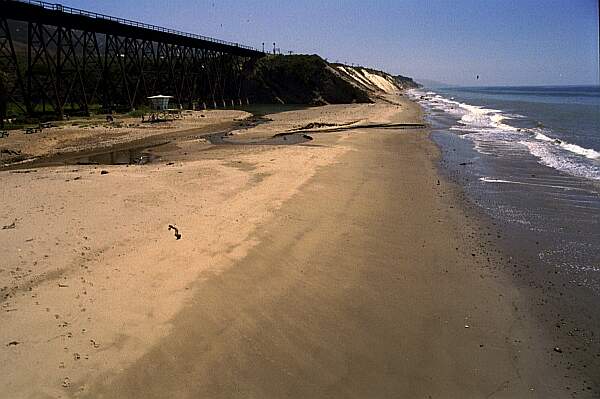 This is a view of the beach from the pier.