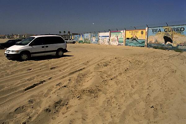 This is the parking for the less-adventurous.  To get 100 yards closer to the entry, take your 4-wheeled drive vehicle down the soft sand trail (lower left of picture) to the next parking area.