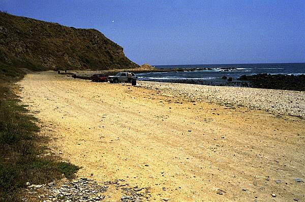 Drive to the South end of the park until you see this gravel area.