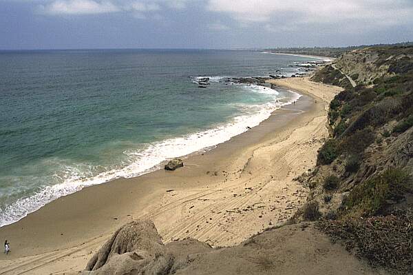 It is a bit of a hike to get to your entry.  The trail down is shown on the cliff in the distance.  Bring a tank cart with you!