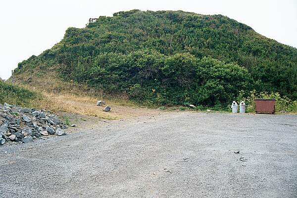 Wind your way around to the North part of the cove, and park in the turn-around area.  If you are camping, you may be able to get the camp site just behind the photographer.