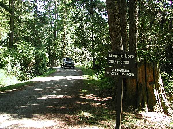 Before parking, find this sign, and drive down the hill.