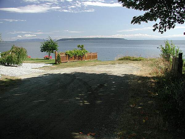 This is a gravel pad at the end of the road.  There is a residence to the left, so please be very quiet.