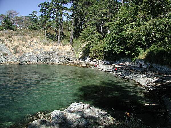 Here's the small, protected beach cove.  A secondary entry is to the left over the rocks, if you find the beach entry too crowded.