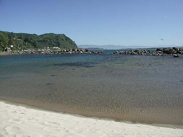 Another view of the jetty during high tide.  The rocks can be slippery, so be careful.