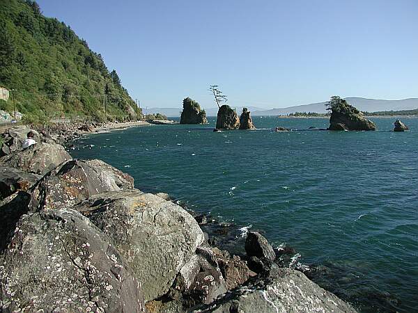 A high tide view, with the entry beach in the background.