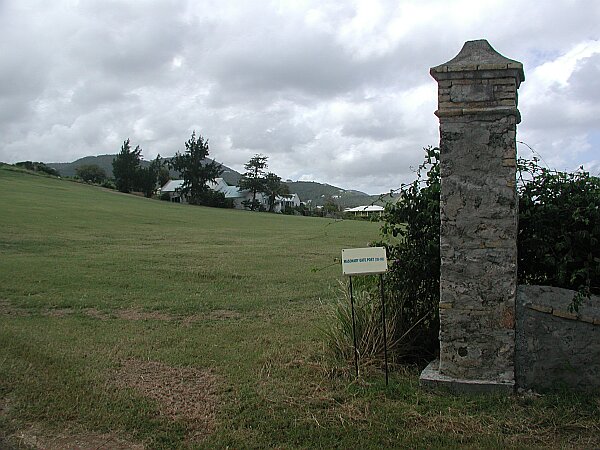 This is the remains of an old entrance to the sugar plantation, and is just opposite the dive site.