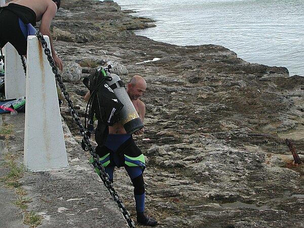 Have your buddy help you get your tanks down the wall.