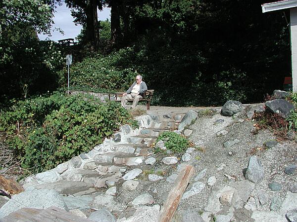 A rock stairway takes you down to the beach.  Restrooms are found in the structure to the right.