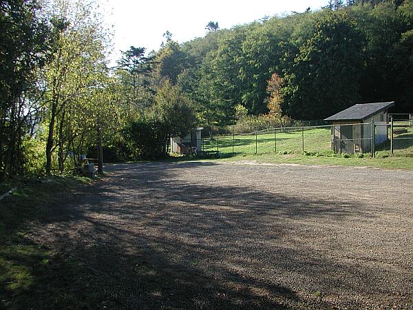 Park anywhere along this gravel pad.  The trail head is in the background to the left.