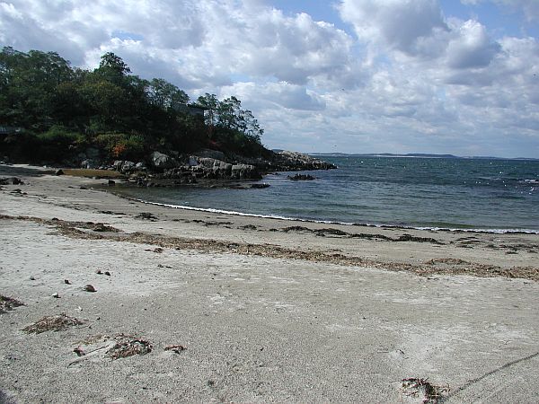 The cove has rocky borders, and the bottom is scattered with large rocks, as well.  You can easily stay within the cove and explore the critters there, or do a surface kick out the deeper water, and then descend.